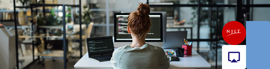 A woman is ttyping on her computer after learning CompTIA exam